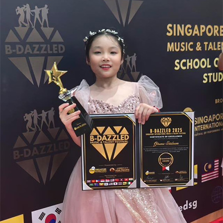 คว้ารางวัล Diamond Award (Piano Grade 1) พร้อม เหรียญทอง